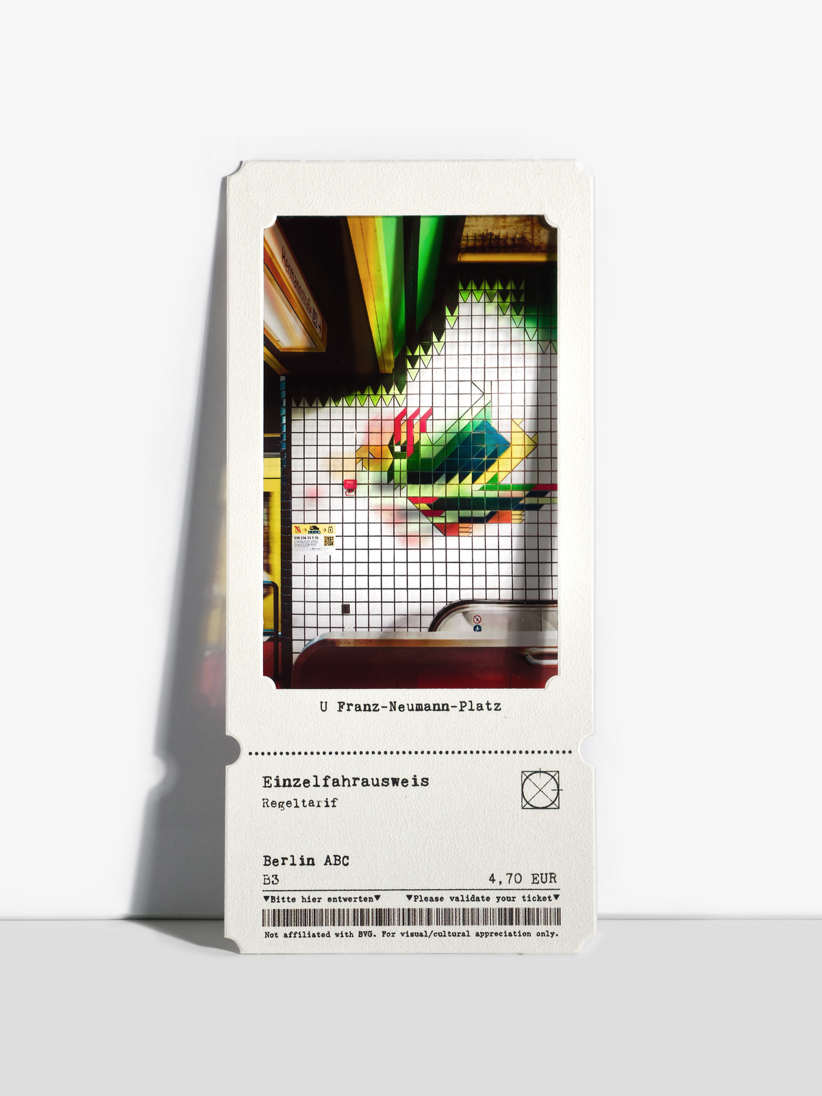 Franzneumann Platz subway stairs featuring mosaic bird art