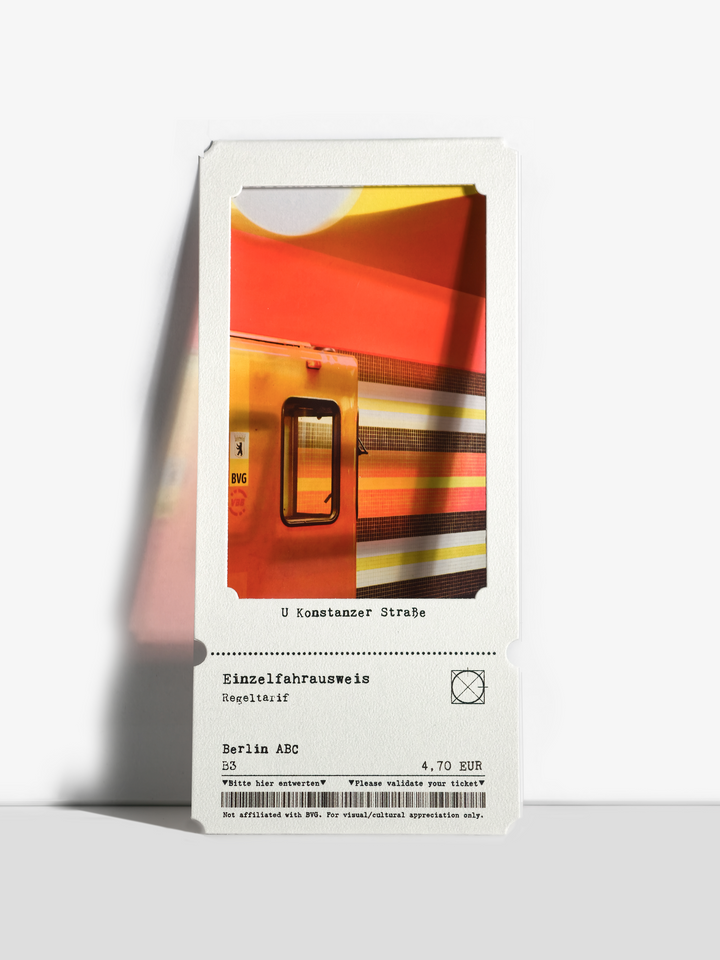 Real Konstanzer Straße U-Bahn scene with orange, yellow, and white motion stripes.