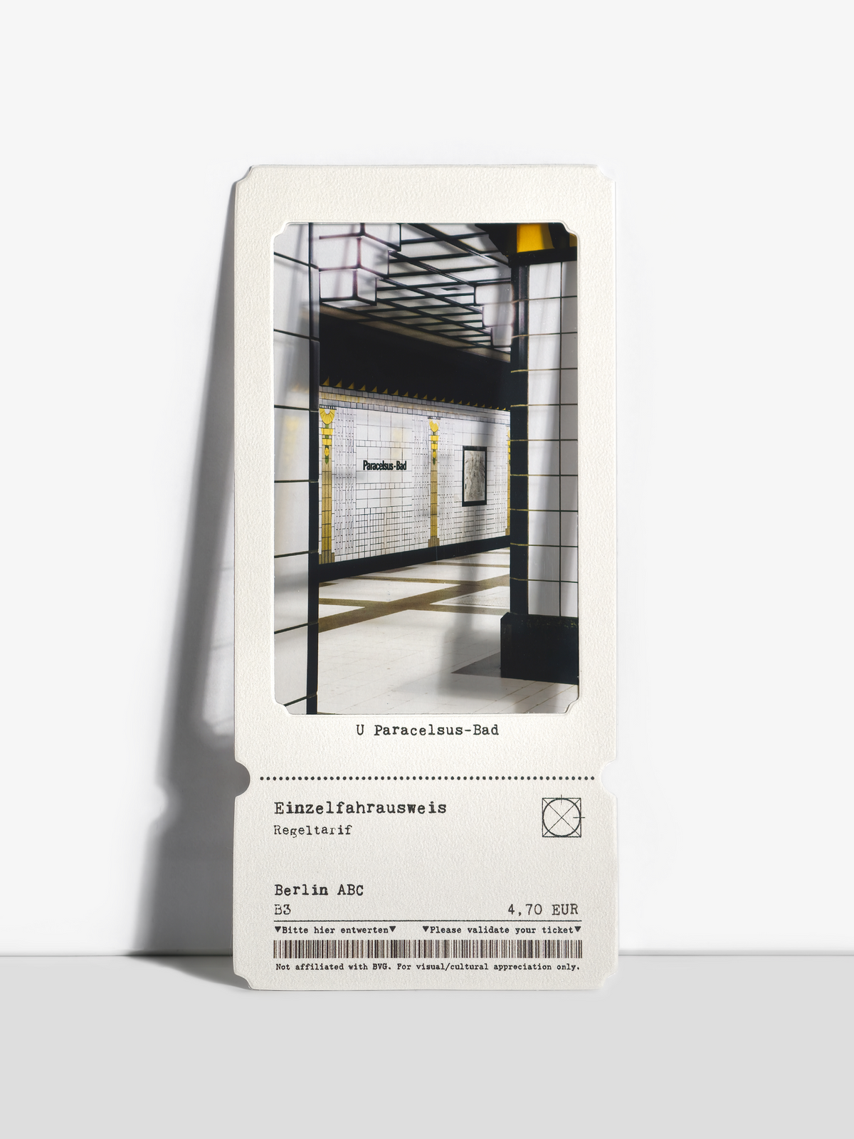Historical Paracelsus-Bad artwork framed by white U-Bahn walls