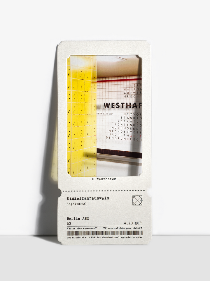 Translucent film print showing Westhafen station tiles and literary quotes.