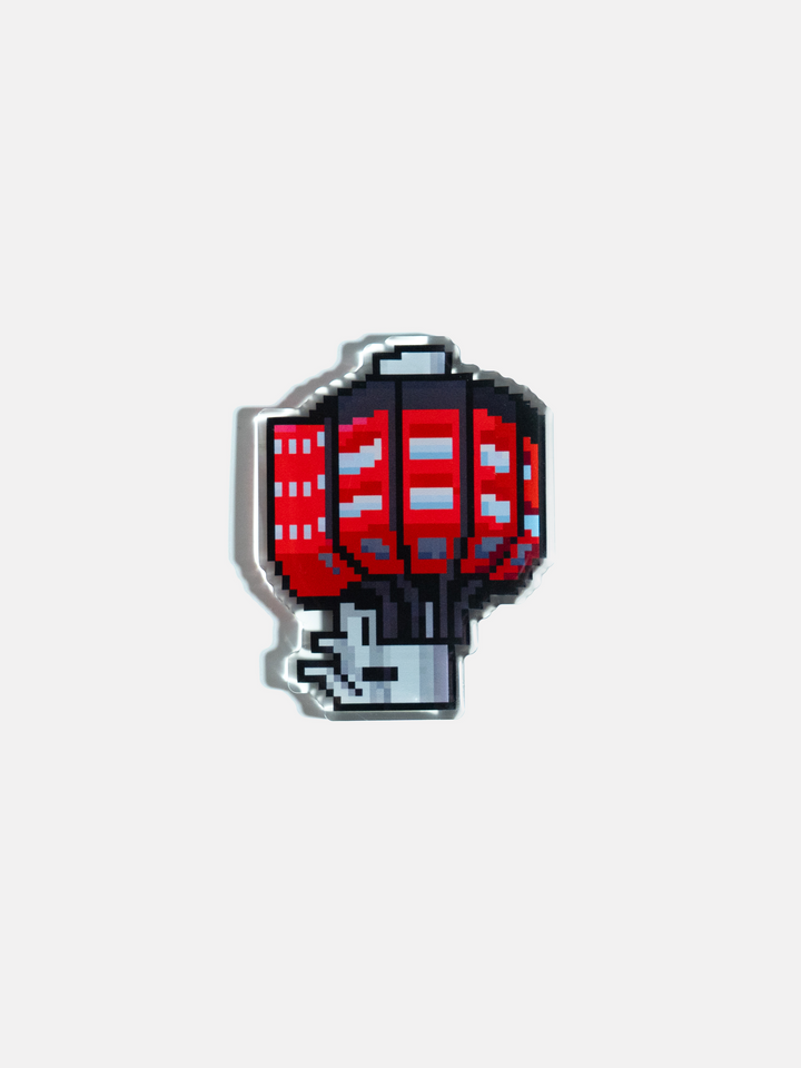 Front view of a retro pixel art beer mug serving as an NFC magnet.