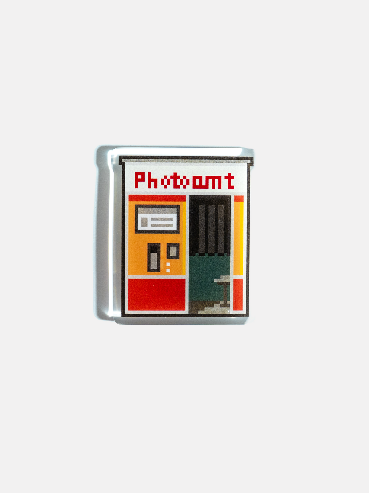 Front view showing the pixelated cartoon-style Photoamt motif on the NFC enabled GIF surface.