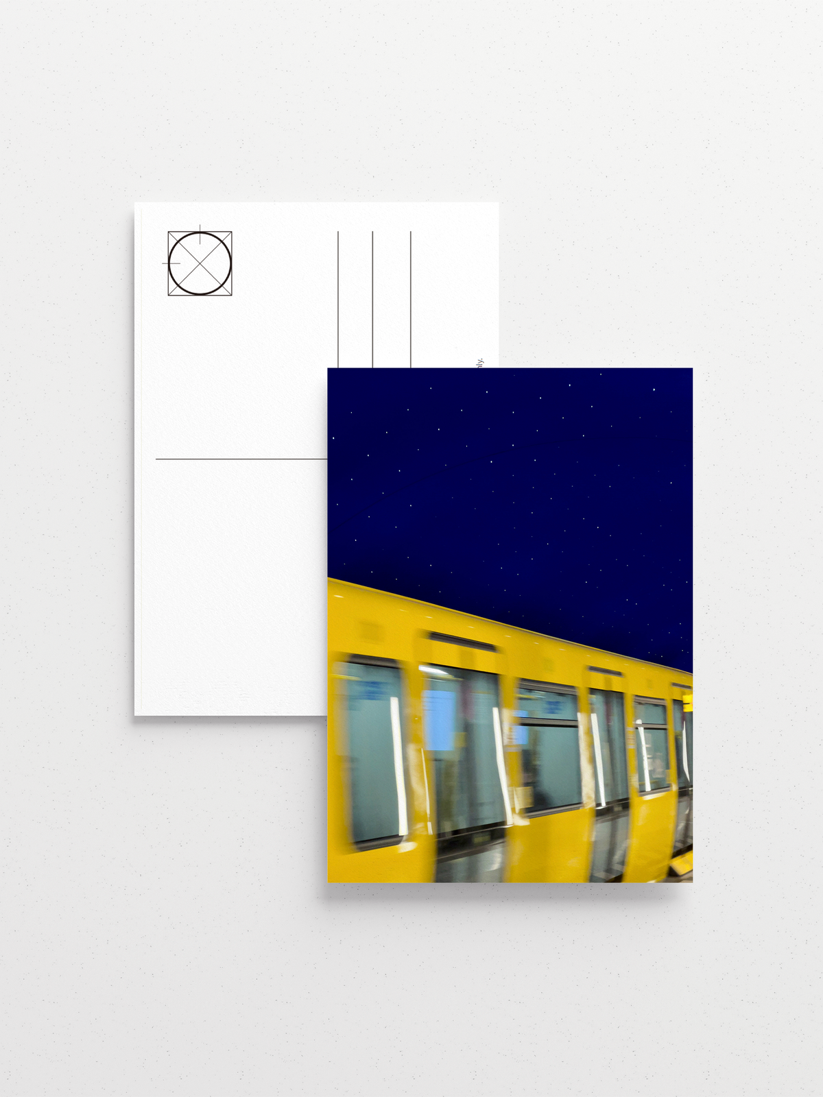 Museumsinsel station interior featuring motion-blurred yellow train and blue vault